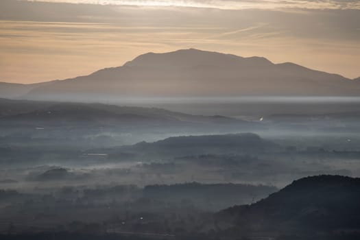 Amazing mountain landscape in a foggy morning in Muntanyola town in Catalonia