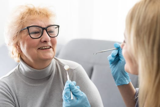 Female dentist and her patient