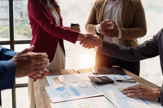 Business partnership meeting concept. Image business people handshake. Successful businessmen handshaking after good deal. Group support concept.