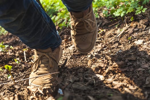 man walking in the forest close up view lfestyle