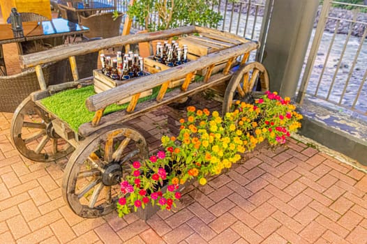 cart with crates of beer at the fair close-up. photo