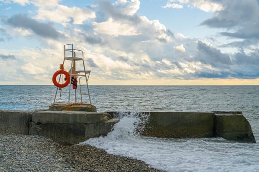 lifeguard observation tower on the seashore without people. photo