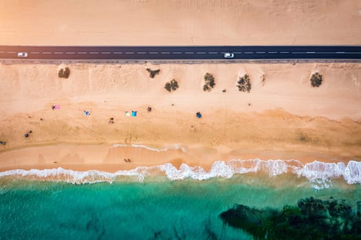 Aerial view of beach in Corralejo Park, Fuerteventura, Canary Islands. Corralejo Beach (Grandes Playas de Corralejo) on Fuerteventura, Canary Islands, Spain. Beautiful turquoise water and white sand.