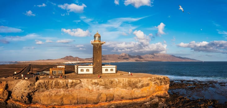 Punta de Jandia lighthouse from above, aerial blue sea, Fuerteventura, Canary Island, Spain. Punta Jandia lighthouse (Faro de Punta Jandia). Fuerteventura, Canary Island, Spain.