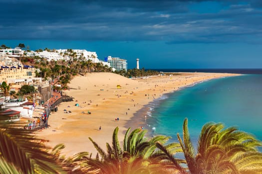 Morro Jable, Fuerteventura, Spain. Breathtaking beach Playa del Matorral in the rays of the sunset. Morro Jable and Playa del Matorral, Fuerteventura, Canary Islands, Spain, Atlantic, Europe
