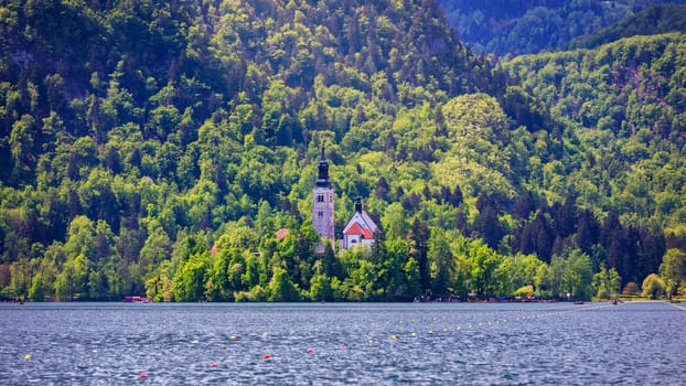 Lake Bled Slovenia. Beautiful mountain lake with small Pilgrimage Church. Most famous Slovenian lake and island Bled with Pilgrimage Church of the Assumption of Maria. Bled, Slovenia, Europe. 
