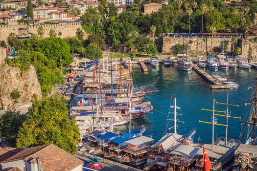 Old town Kaleici in Antalya. Panoramic view of Antalya Old Town port, Taurus mountains and Mediterrranean Sea, Turkey.