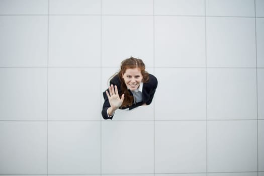 Full size photo of young smiling happy positive good mood girl go to. view from above