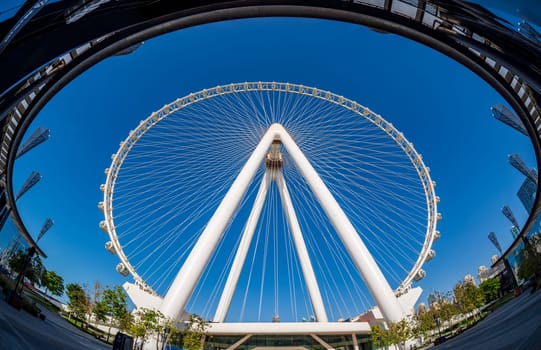Circular view with fish eye lens at Ain Dubai Observation Wheel on BlueWaters Island with building surrounding