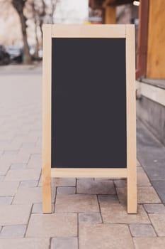 Mockup empty blank of cafe menu chalkboard on street - copy space and empty space for advertising mock-up concept
