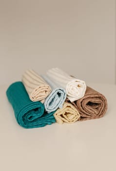 linen napkins lie twisted on the table. Close-up