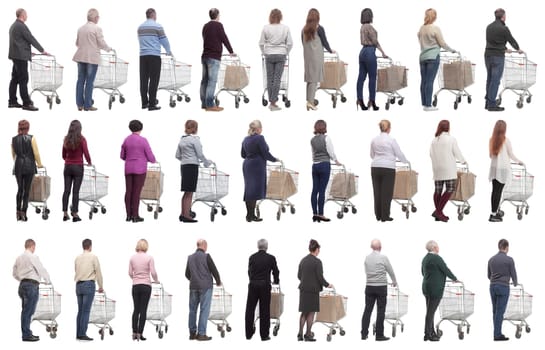 a group of people with a cart stand with their backs isolated on a white background