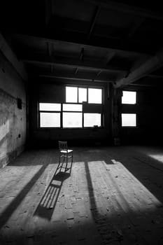 Black and white photo of abandoned building interior