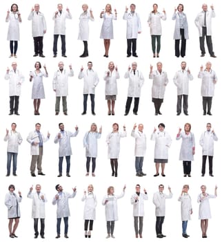 group of doctors in full length isolated on white background