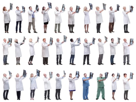 group of doctors holding x-ray isolated on white background