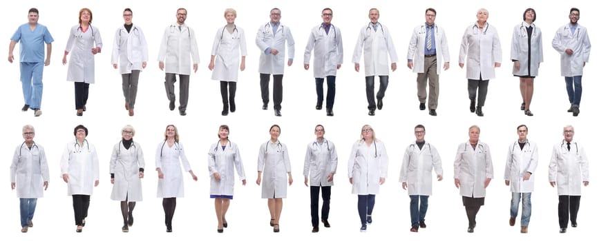 group of doctors in motion isolated on white background