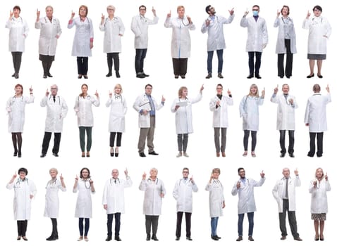 group of doctors in full length isolated on white background