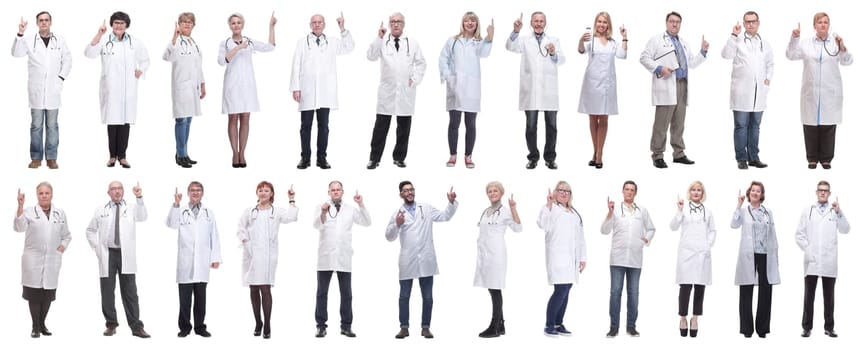 group of doctors in full length isolated on white background