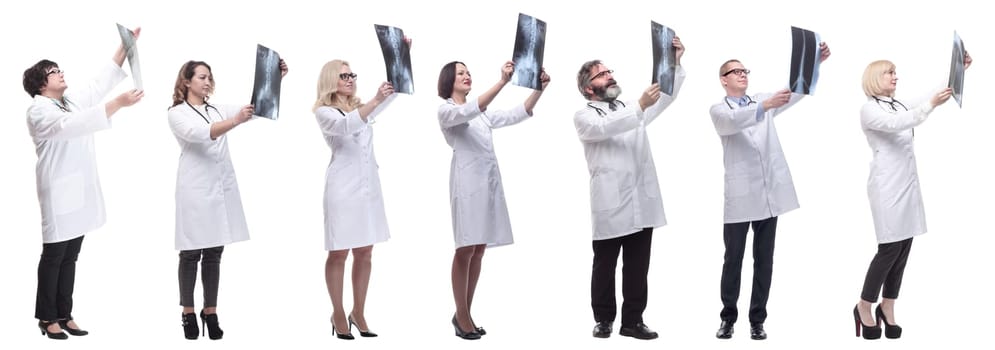 group of doctors holding x-ray isolated on white background