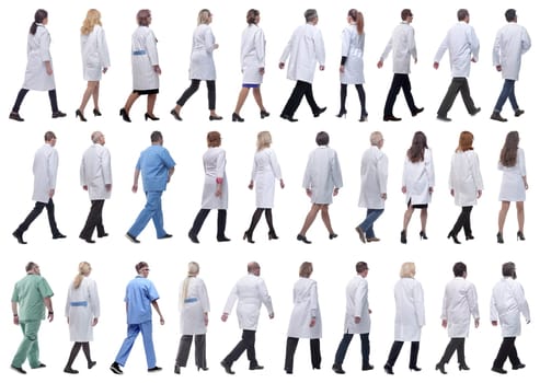 group of doctors in motion isolated on white background