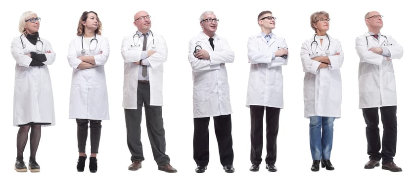 group of doctors standing in full length isolated on white background