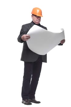 side view. architect in a protective helmet looking ahead. isolated on a white background