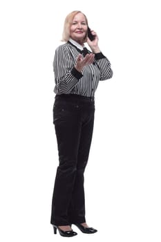 in full growth. Executive business woman with a smartphone. isolated on a white background.
