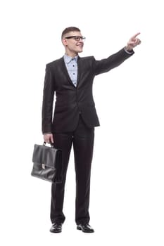in full growth. smiling young businessman with a leather briefcase. isolated on a white background.