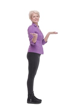 in full growth. attractive mature woman in casual clothing. isolated on a white background.