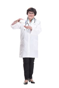 in full growth. senior female doctor with sanitizer in hand . isolated on a white background.
