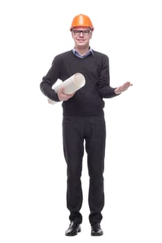 A view of a young construction worker wearing helmet and holding blueprints isolated on white background