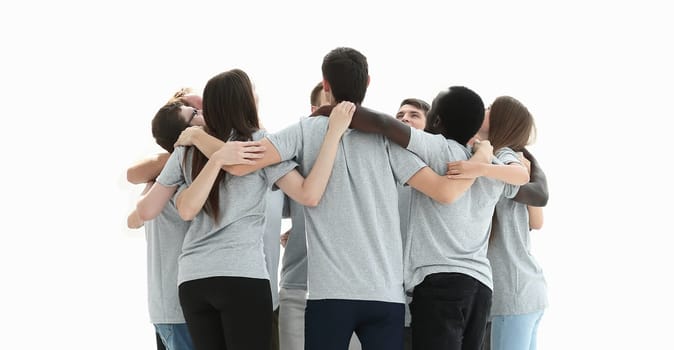 in full growth. a group of young people standing in a circle . photo with copy space