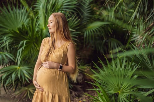 Pregnant woman walks in park at evening. Family enjoying pregnancy. The concept of Mother's Day and Women's Day.