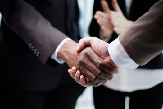 Two engineers business people shaking hands on successful deal corporate partnership agree for cooperation