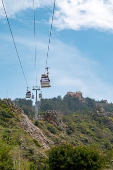View of Alanya castle and cable car cabins from the cable car cabin