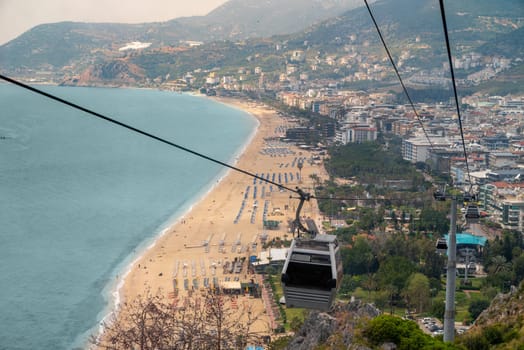 Top view of Cleopatra beach and Alanya from the cable car to Alanya castle