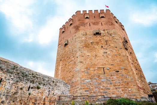 Ancient red tower in Alanya Turkey on a sunny day