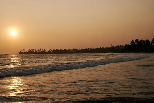 Sunset on the ocean in Sri Lanka. High quality photo