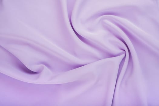 Light purple color fabric background.