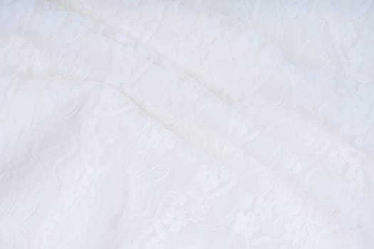 White background with lace flower. Texture background pattern.