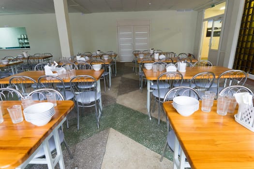 Chairs and tables. The dining hall is quarantined.