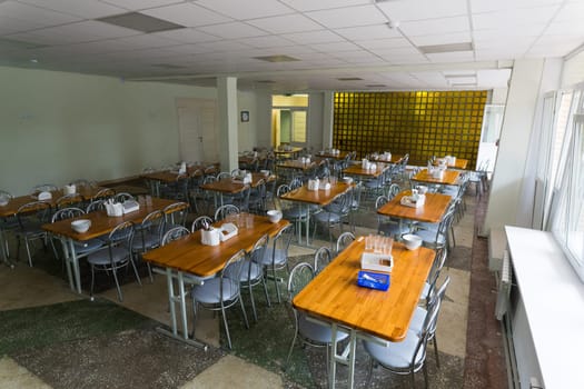 Chairs and tables. The dining hall is quarantined.