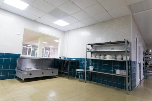 Restaurant kitchen equipment for preparing food, meal, plates, details.