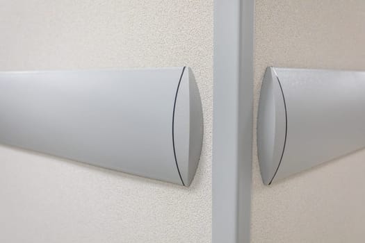 In the public building, bumpers are installed on the walls in all corridors. Protecting the walls from mechanical damage.