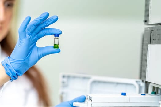 examination of a chemical sample using modern devices in the biochemical laboratory of the research institute. High quality photo