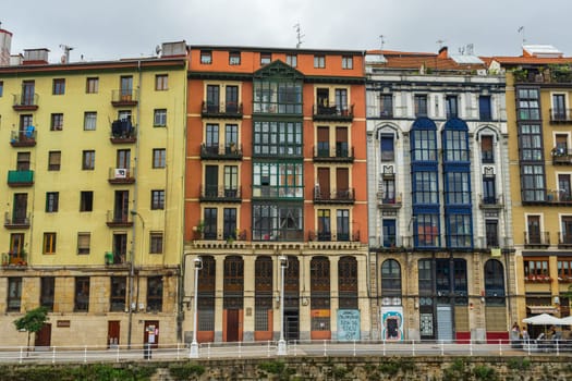 Bilbao, Basque Country, Spain - 08.06.2022: colorful architecture apartment buildings exquisite balcony, Bilbao Spain