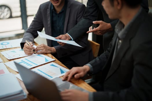 startup Asian business advisor meeting to analyze and discuss the situation on the financial report in the meeting room.Investment Consultant, Financial , teamwork ,brainstorming and accounting