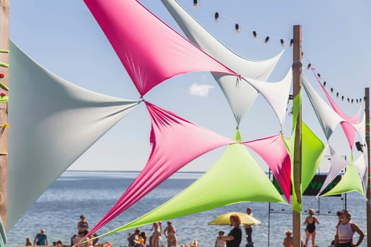 colorful decorative sail on the river bank in Ukraine.