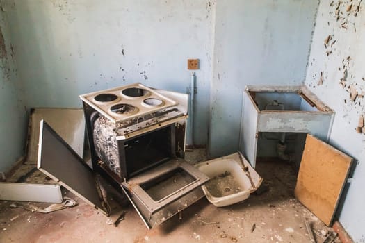 looted kitchen in an abandoned house in Pripyat Ukraine.