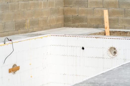 construction of a swimming pool at a family house. High quality photo